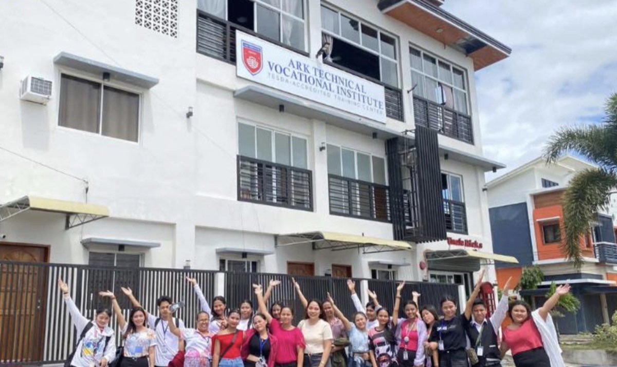 Ark Institute training group in front of the main building
